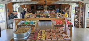 customers shopping at madison, al farm market