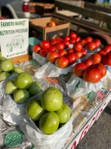 shoppers enjoying morning market in downtown arab